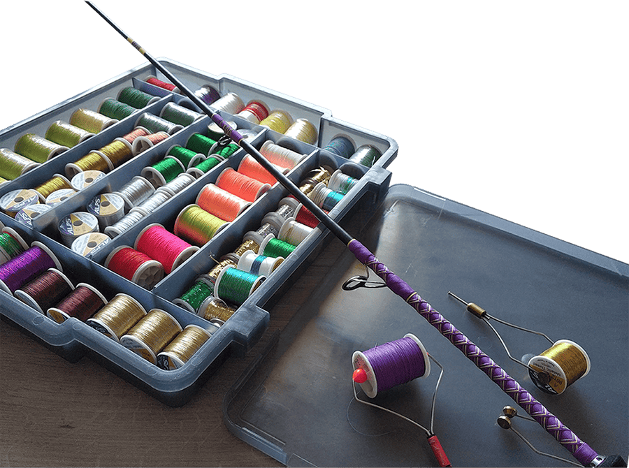 A full box of colorful thread for making rods