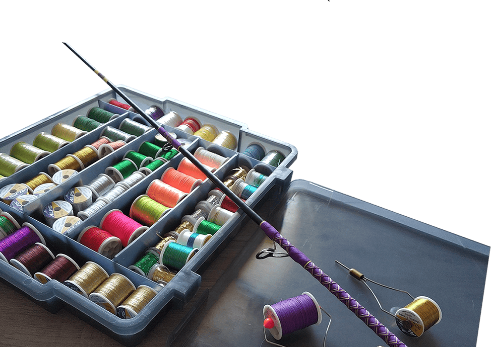 A full box of colorful thread for making rods